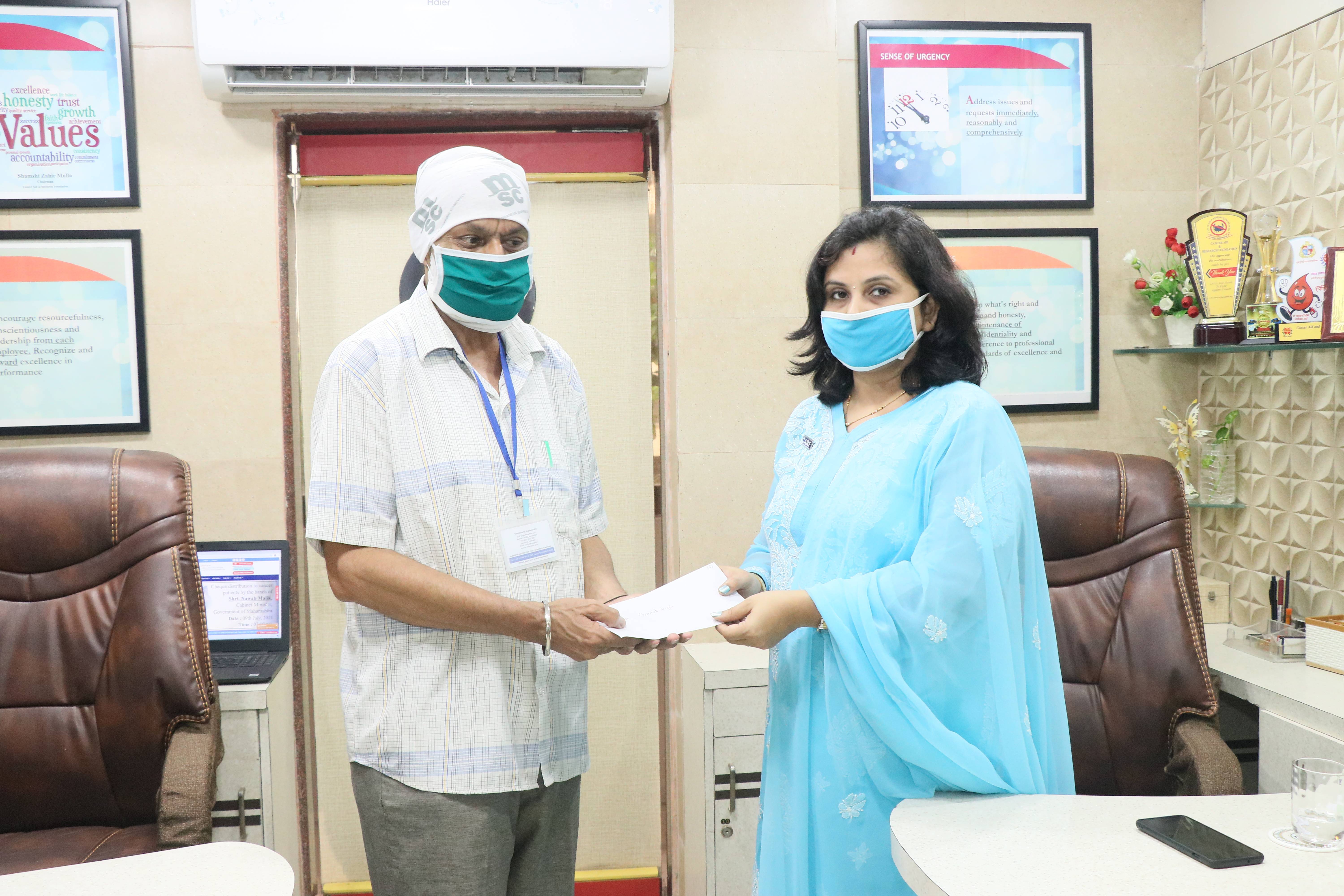 Cheque Distribution by Shri. Nawab Malik photo gallery cover